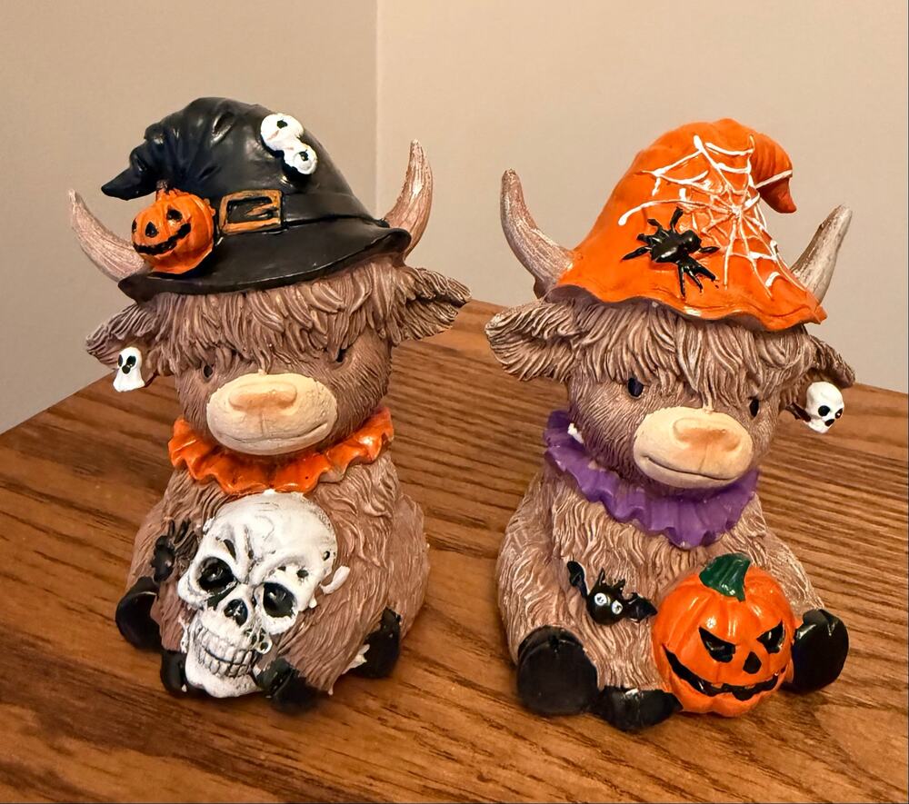 New resin Halloween Highland Cow tabletop figurines wearing witch hats.